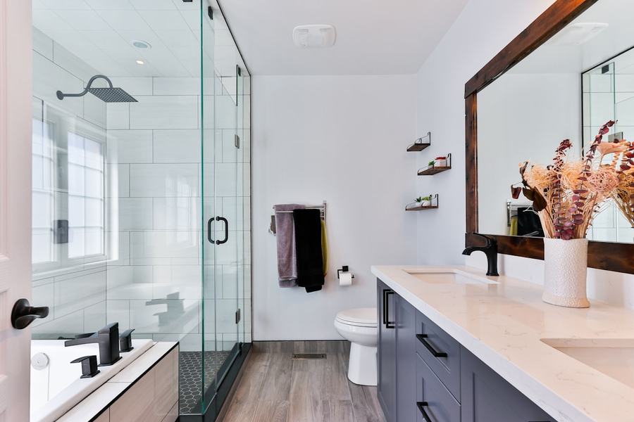 A modern, accessible bathroom with a level-entry shower.